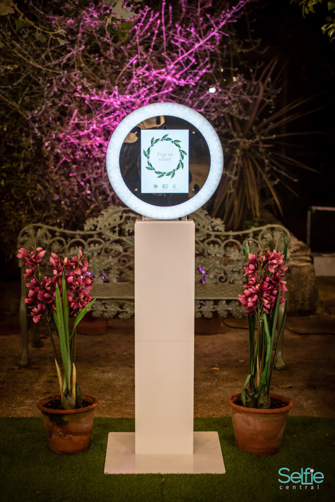 A photo booth at a wedding reception in Auckland — wedding photo booth social sharing